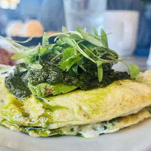 Green Omelette - close up of the delicious melty goat cheese!