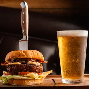 a burger and a glass of beer