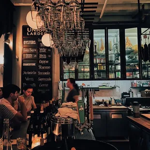 people sitting at a bar