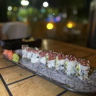 a plate of sushi on a table