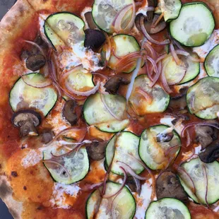 POW: red sauce topped with cremini mushrooms, zucchini, red onions, mozzarella = $18