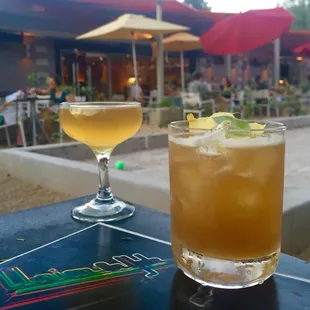 Cocktails on the patio! The Remedy (front) and The Bun &amp; The Penny (back). Loved the sage in the remedy!