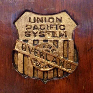 On the end of one of the benches inside.