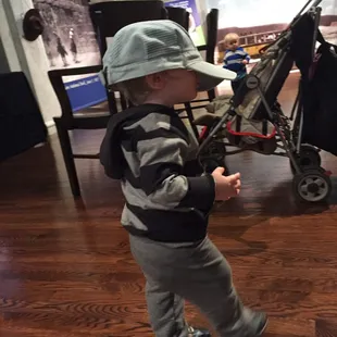 Little guy in a conductor's hat