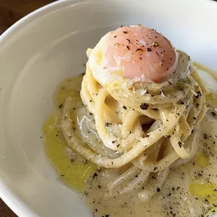 TONNARELLI CACIO E PEPE
 Pecorino-Romano, black pepper, 63°C egg*