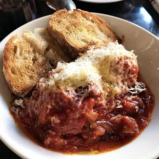 PORK MEATBALLS
 San Marzano tomato, caper berries, chile