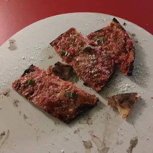 Burned piece of tortilla with cheese so called "pizza"!