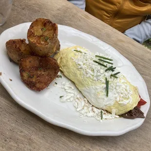 Brisket omelette with melted potatoes