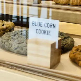 a display of cookies and pastries