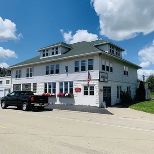 a truck parked in front of the building