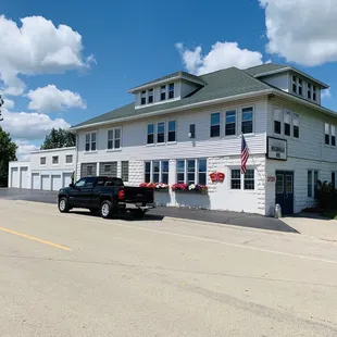 a truck parked in front of the building