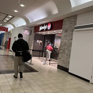 a man carrying a bag