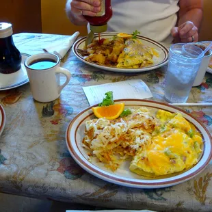 a man eating breakfast at union street cafe
