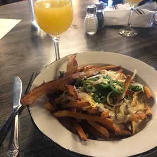 Dirty brunch friends (with mushroom gravy), a side of bacon, and an orange juice mimosa!