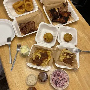 Still just as good to-go: Woodshop 101 (Beef Brisket, Back Ribs, House Smoked Chicken Wings) &amp; Beef Brisket