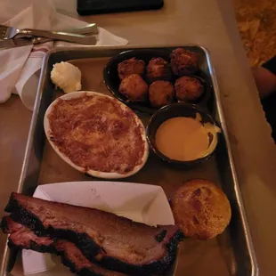 Brisket, Mac and cheese, tots, and corn bread