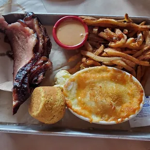 Brisket with AMAZING fries, macaroni &amp; cheese (also AMAZINGGGG), corn muffin, dollop of butter and a delicious dipping sauce