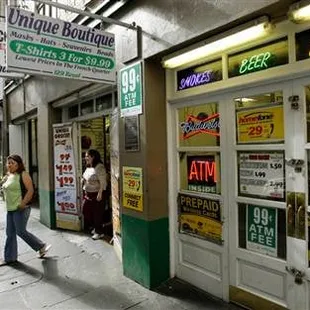 a woman walking down the sidewalk