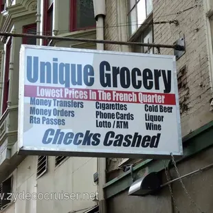 a sign for unique grocery