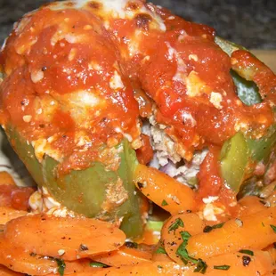 Baked Stuffed Green Peppers with Ground Turkey, Brown Rice, Black Olives, Red Onion, Red Pepper, Corn, Eggs, Thai Chili Paste.