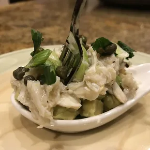 Avocado Topped with Cilantro Lime Blue Crab, Capers, Cilantro, and Scallion