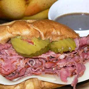 French Roll Dipped in Au Jus, Stuffed with Juicy Pastrami and Layered with Swiss Cheese, Mustard and Dill Pickle Chips.