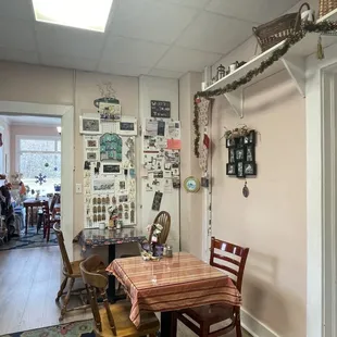 a dining room with a table and chairs