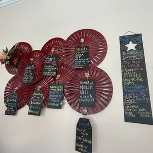 a wall with a variety of menus on it