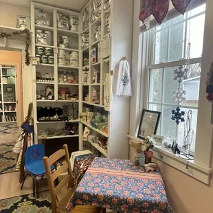 a kitchen with a table and chairs