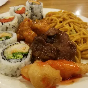 a plate of asian food