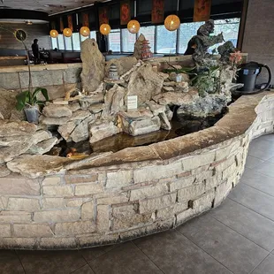 Little fountain with Koy fish inside the waiting area