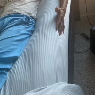 Lying on the second mattress that was delivered. This was sent to replace the initial one that was damaged and they claim it is new..