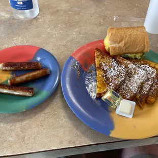 Peppered Egg Sandwich and a French Toast plate with sausage links