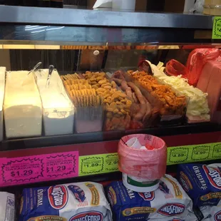a variety of cheeses and other foods