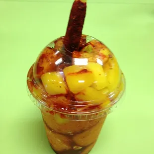 Mangonada.....looks freakin' awesome but I don't even know how to eat it!