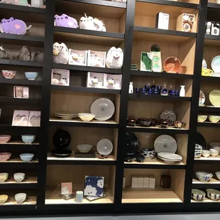 a display of dishes and bowls