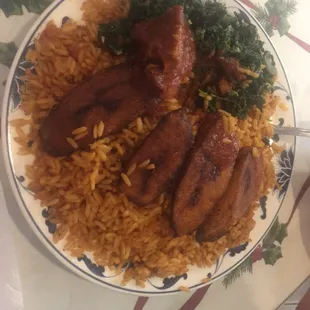 Jellof rice, plantain, spinach and beef