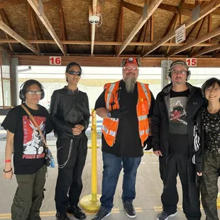 My husband and kids with Jay after a day at the Shooting Range.