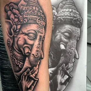 Illustrative black and gray Ganesha tattoo by Efrain 'EJ' Segoviano, displaying artistic finesse and reverence for cultural symbolism.