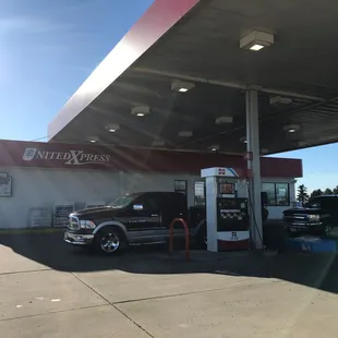 a truck at a gas station