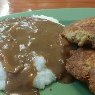 Salmon croquettes, grits, and gravy!! The bomb.com!!!