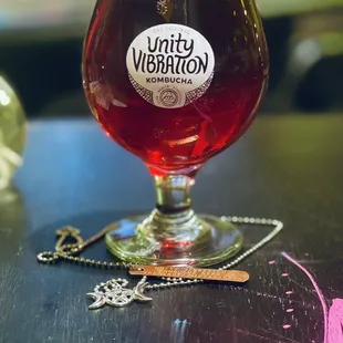 a glass of beer on a table