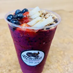 a smoothie in a plastic cup