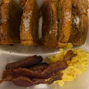 French Toast Breakfast with bacon and sausage. With scrambled eggs.