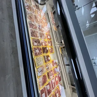 a display of meat in a store