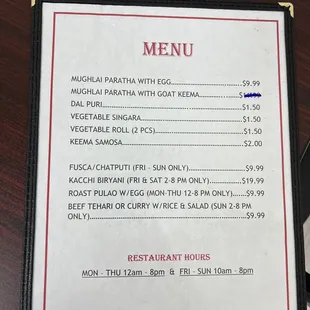 a menu on a wooden table