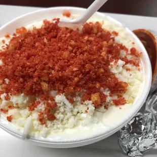 Corn in the cup with chopped up Cheetos