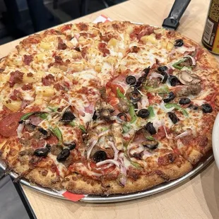 1/2 deluxe 1/2 Hawaiian (Hawaiian comes with bacon!)