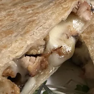 University Club of San Francisco, $12 quesadilla + $6 for the addition of chicken.