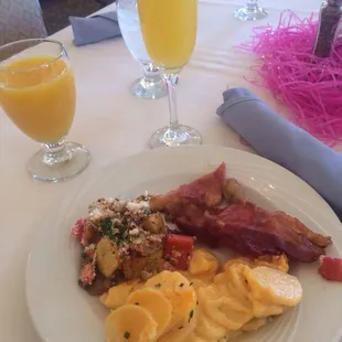 My plate of food and delicious mimosa in the background!